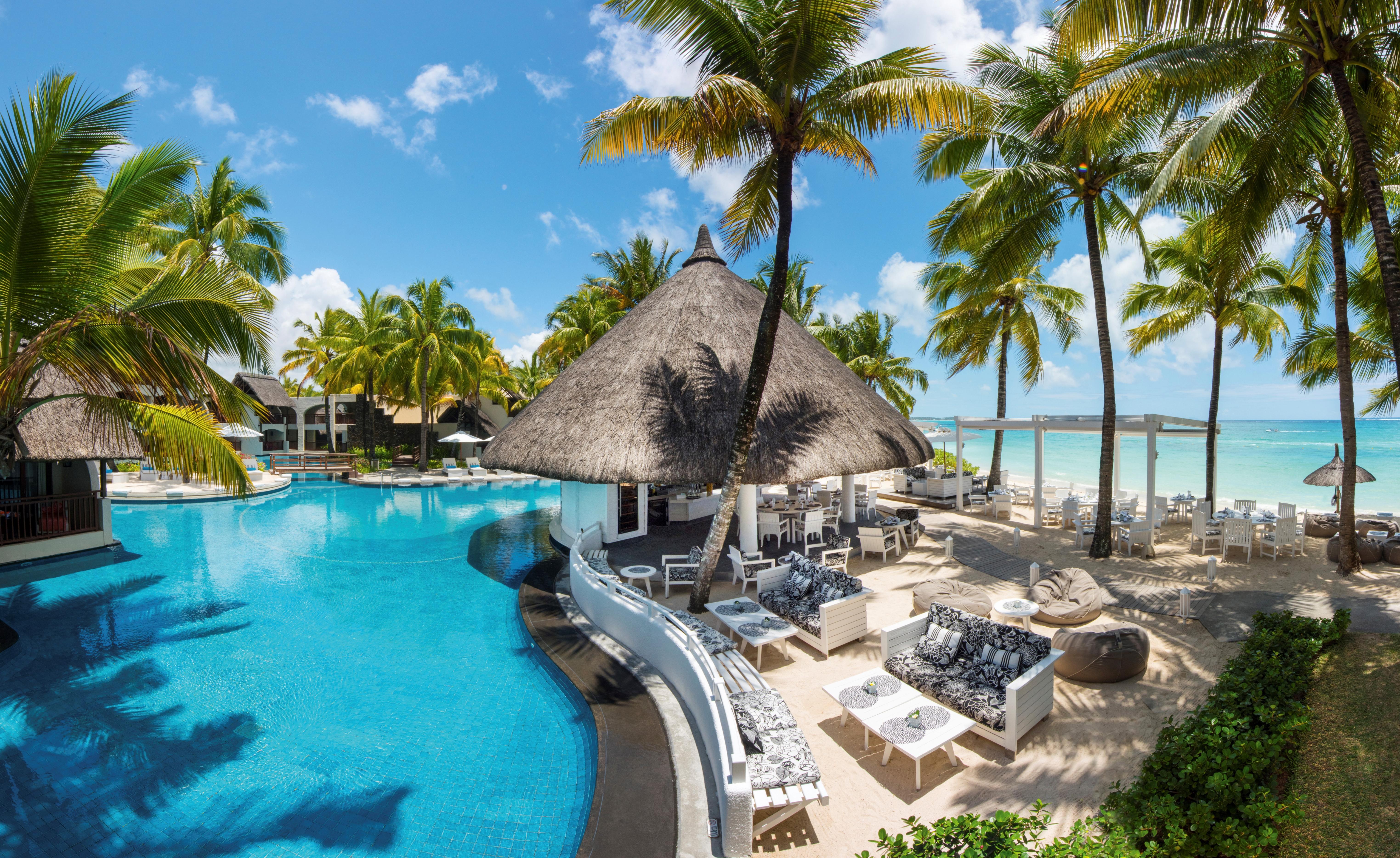 Constance Belle Mare Plage Bagian luar foto The swimming pool at the resort